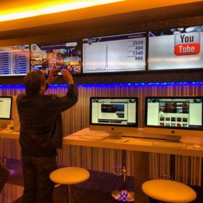 guy-kawasaki-starkey-2014 Guy Kawasaki taking picture of Social Media Wall